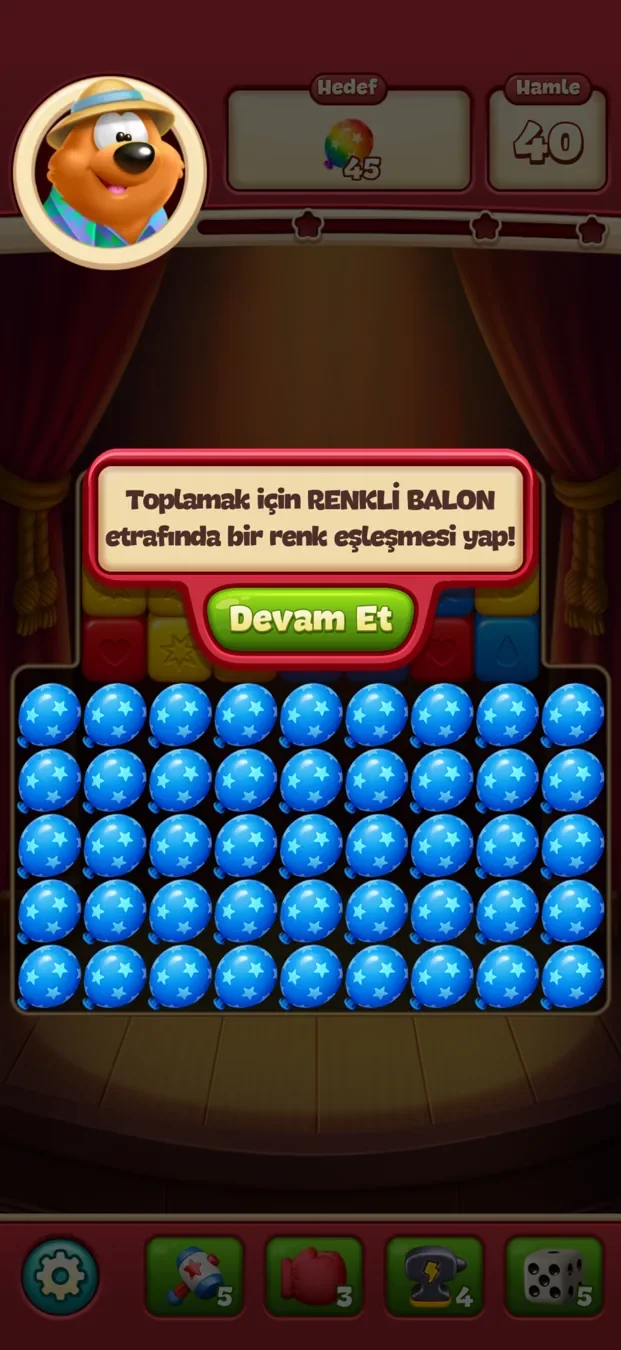 Toon Blast contextual tutorial introducing the coloured balloon mechanic